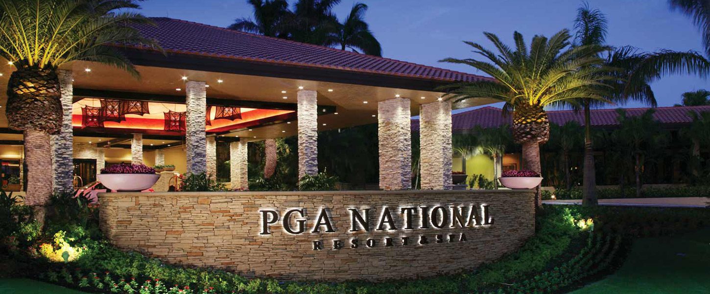 Entry to PGA National Resort, front entry, dusk.