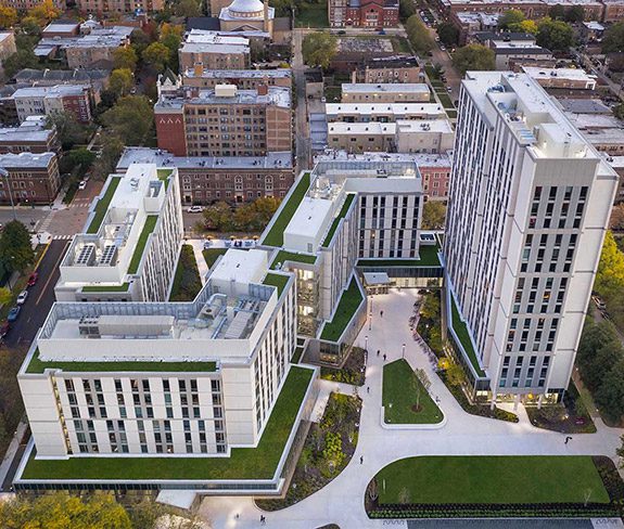 Aerial view of the Woodlawn Residential Commons, University of Chicagom tall and mid-rise buildings ina complex