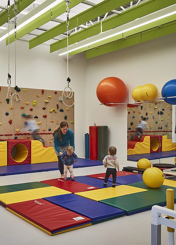 Children in pediatric rehab gym