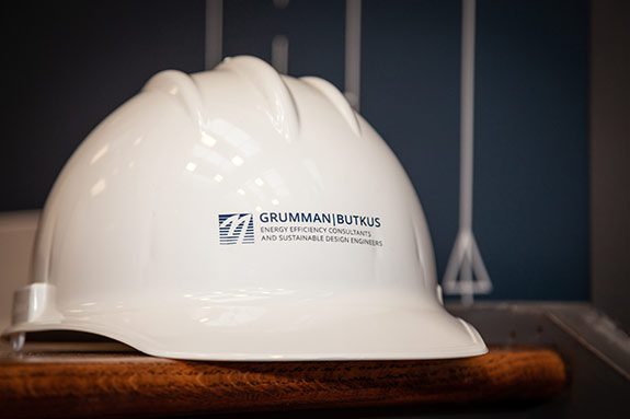 White hard hat with GBA logo on the front.