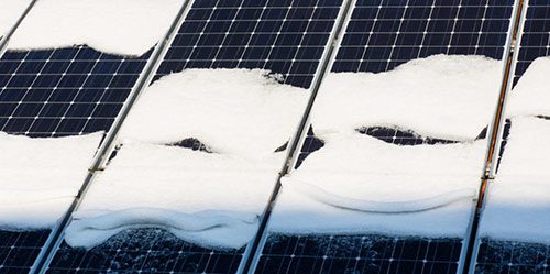 Photovoltaic panels covered in snow