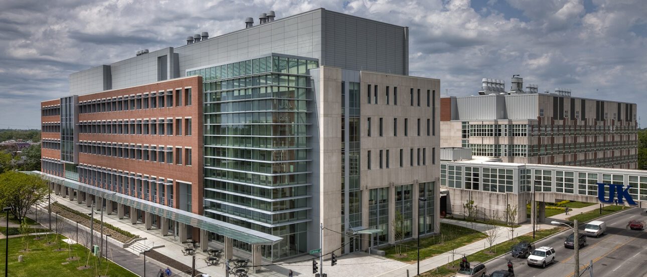 Exterior photograph of a multi-story laboratory building on an academic campus