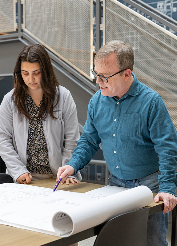engineers reviewing drawings